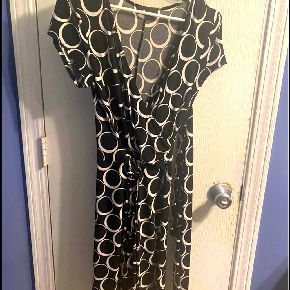 Black and white circle pattern cocktail dress.